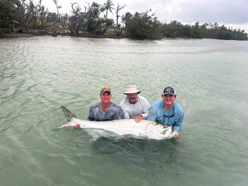 Group of anglers with a tarpon in the Boca Grande area